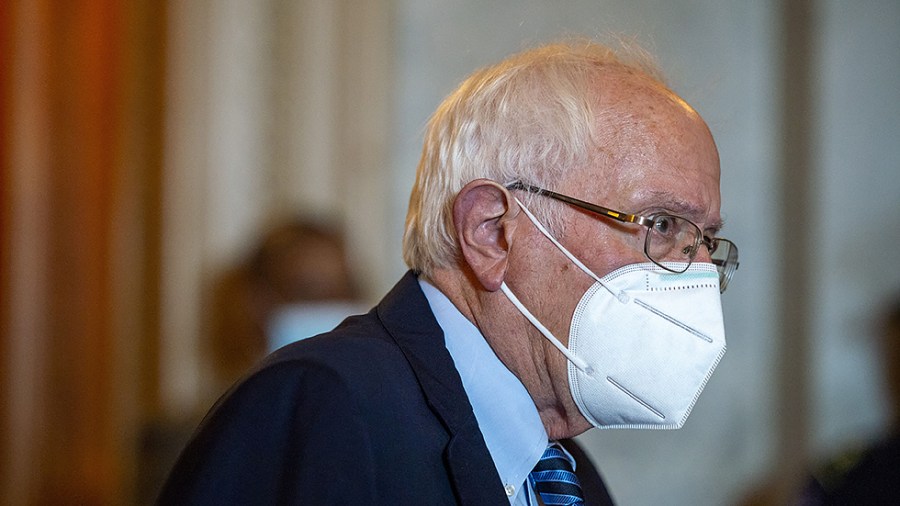 Sen. Bernie Sanders (I-Vt.) leaves the Senate chambers after final passage of $1.2 trillion infrastructure bill on Tuesday, August 10, 2021.