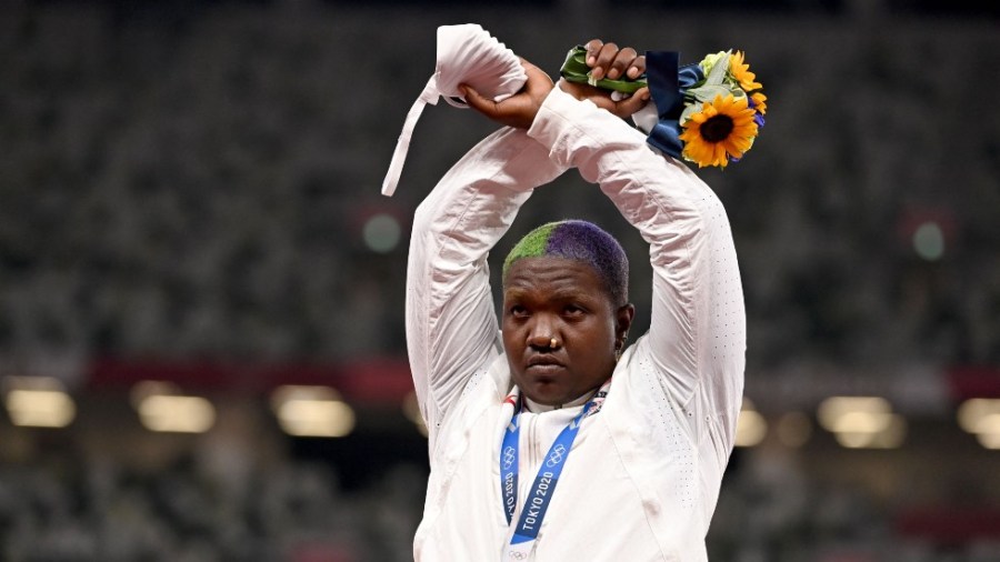 U.S. shot-putter Raven Saunders stands with arms crossed