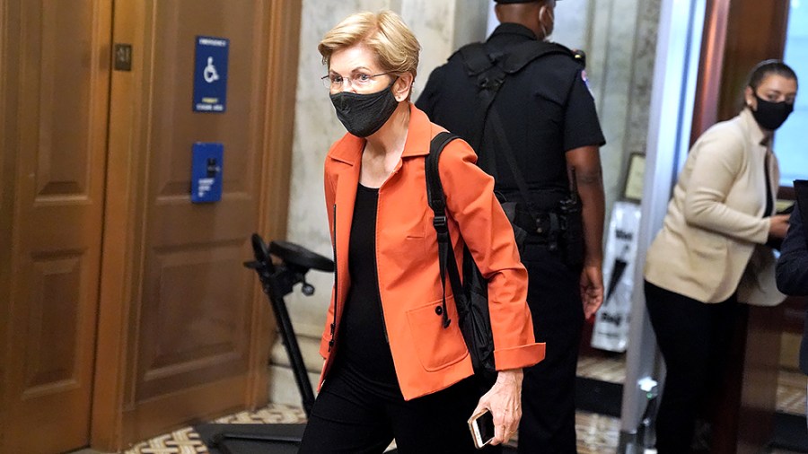 Sen. Elizabeth Warren (D-Mass.) arrives to the Capitol prior to a nomination vote on Wednesday, August 4, 2021.