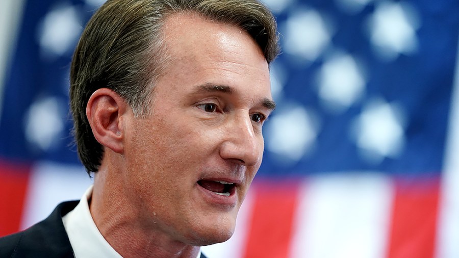 Virginia Republican gubernatorial candidate Glenn Youngkin speaks to a local t.v. news station after announcing his jobs and tax cut plan at an event at CJ Coakley Co. in Fairfax, Va., on Monday, August 30, 2021.