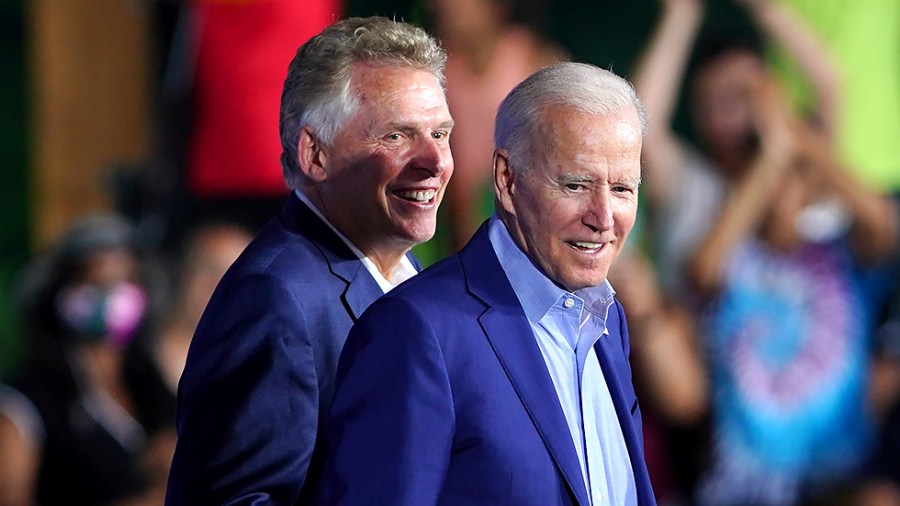 Virginia Democratic gubernatorial candidate Terry McAuliffe and President Biden are seen after a grassroots campaign event at Lubber Run Park in Arlington, Va., on Friday, July 23, 2021.