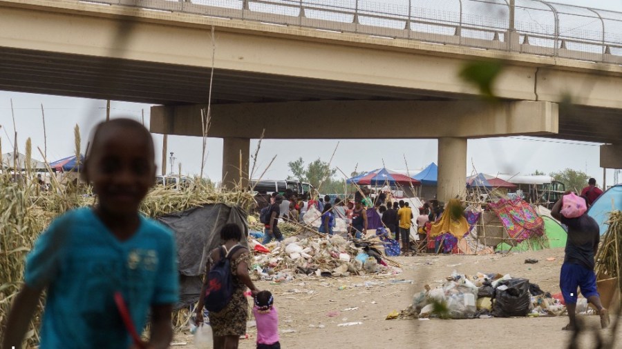 Migrants under a bridge in Del Rio, Texas