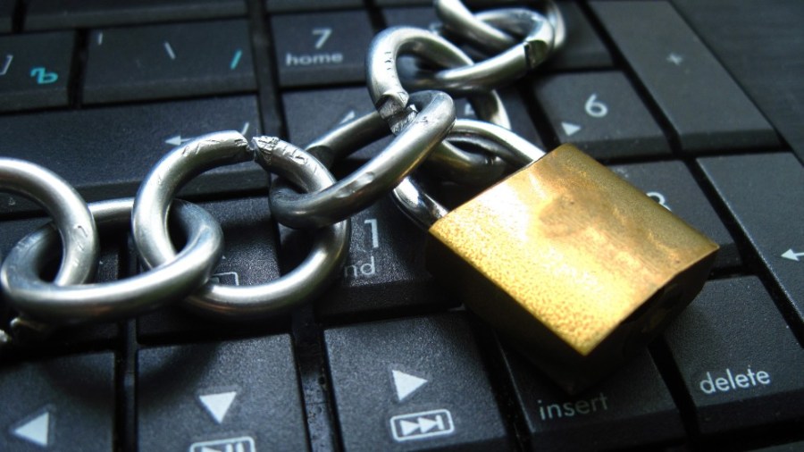 Internet freedom lock and chain, keyboard