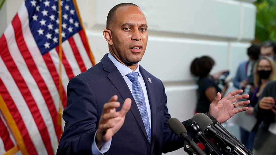 Rep. Hakeem Jeffries (D-N.Y.) addresses reporters after a closed-door Democratic caucus meeting on Tuesday, September 28, 2021.