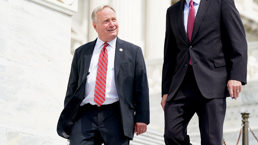 Rep. David Joyce (R-Ohio) speaks to Rep. Darin LaHood (R-Ill.) as they leave the Capitol following the last votes of the week on Thursday, July 1, 2021.