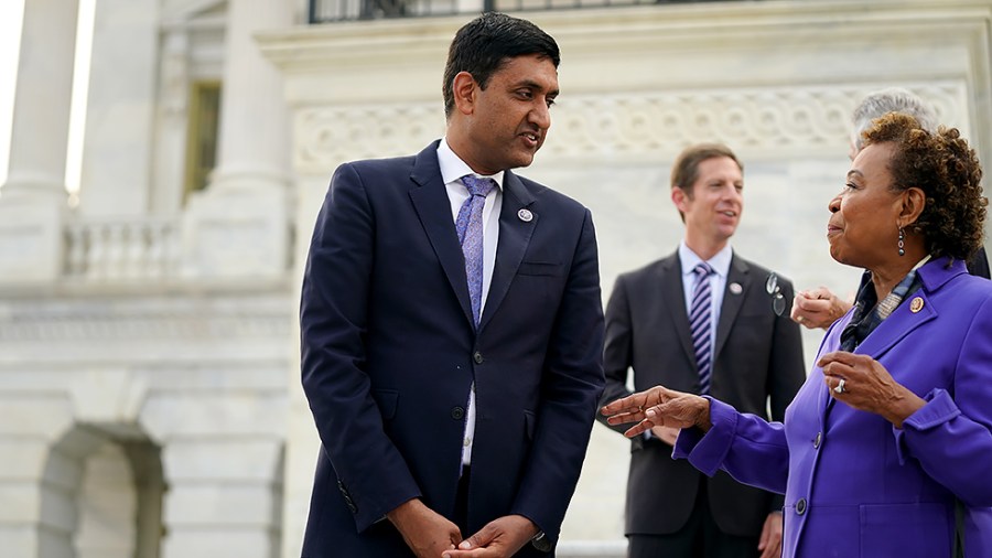 Rep. Ro Khanna (D-Calif.) speaks to Rep. Barbara Lee (D-Calif.) after members Congressional Progressive Caucus took a photo outside the House Chamber on Monday, July 19, 2021.