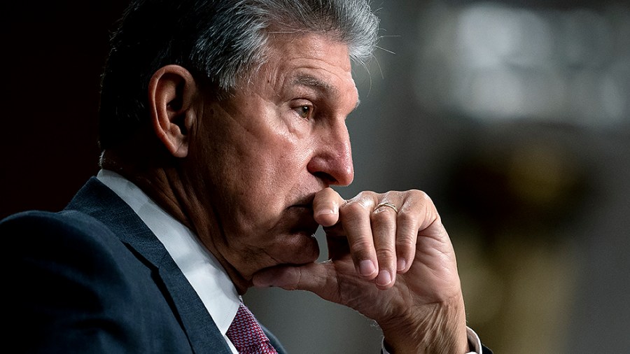 Sen. Joe Manchin (D-W.Va.) pauses during a Senate Armed Services Committee hearing at the Dirksen Senate Office building in Washington on Tuesday, September 28, 2021