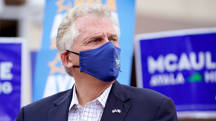 Virginia Democratic gubernatorial candidate Terry McAuliffe is seen during a campaign stop outside the Fairfax County Government Center in Fairfax, Va., as the state opens the polls for the first day of early voting on Friday, September 17, 2021.