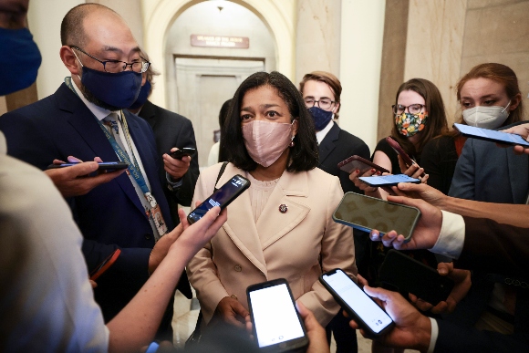 Rep. Pramila Jayapal (D-WA) waks towards reporters