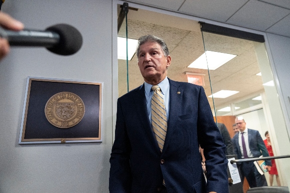 Sen. Joe Manchin (D-WV) leaves a meeting of bipartisan Senator