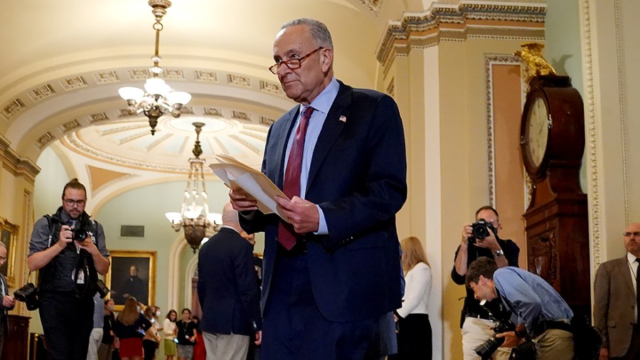 Majority Leader Charles Schumer (D-N.Y.) arrives for a press conference after the weekly policy luncheon on Tuesday, July 20, 2021.