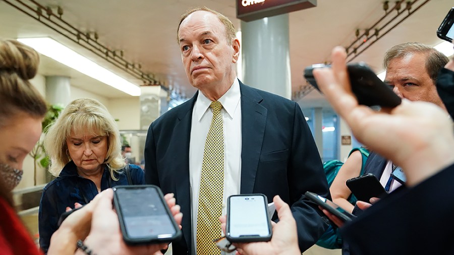 Sen. Richard Shelby (R-Ala.) speaks to reporters as he arrives to the Capitol for a vote on Tuesday, July 27, 2021.