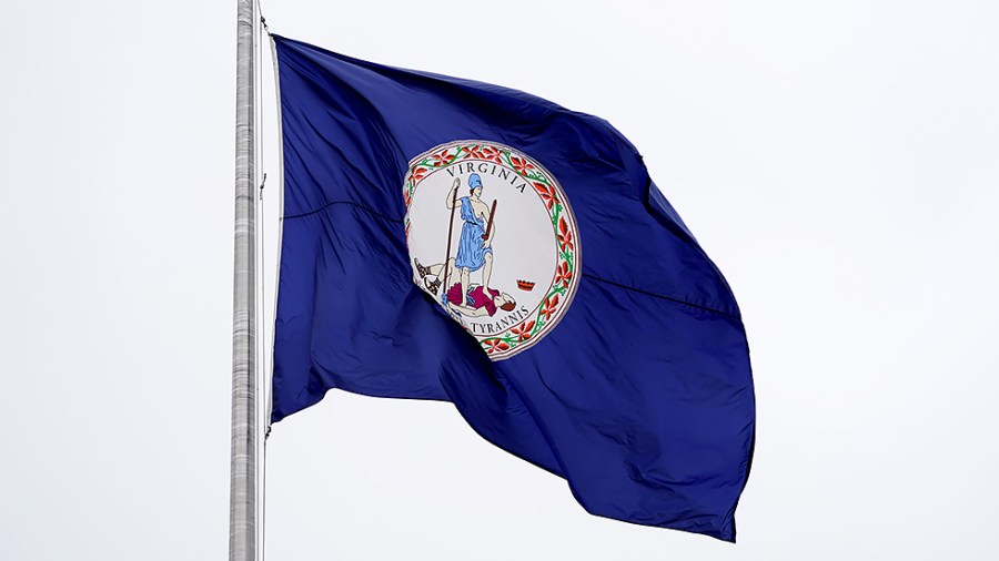 The Virginia state flag is seen at the Fairfax County Government Center in Fairfax, Va,, on Friday, September 17, 2021.