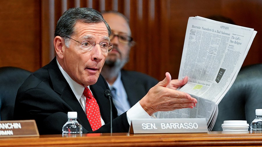 Sen. John Barrasso (R-Wyo.) points to a Wall Street Journal article while questioning nominee to be Director of the National Park Service Charles Sams III during his Senate Energy and Natural Resources Committee nomination hearing on Oct. 19