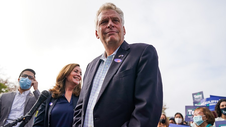 Virginia Democratic gubernatorial candidate Terry McAuliffe addresses reporters after casting his ballot during early voting at the Fairfax County Government Center in Fairfax, Va., on Wednesday, October 13, 2021.