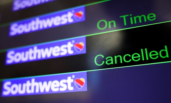 A screen displays Southwest Airlines flight information