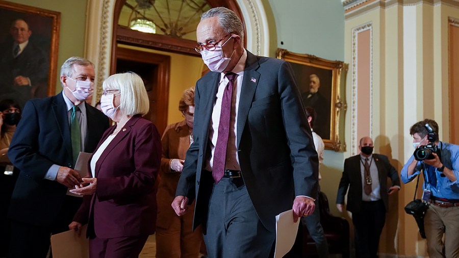 Majority Leader Charles Schumer (D-N.Y.) arrives for a press conference after the weekly policy luncheon on Tuesday, October 19, 2021.