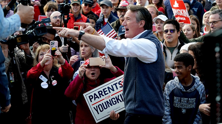 Virginia Republican gubernatorial candidate Glenn Youngkin greets supporters and potential voters at the Alexandria Farmers Market in Alexandria, Va., on Saturday, October 30, 2021.