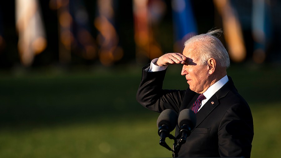 President Biden looks for a guest as he gives remarks during a bill ceremony for the Infrastructure Investment and Jobs Act during a ceremony on the South Lawn of the White House on Monday, November 15, 2021.