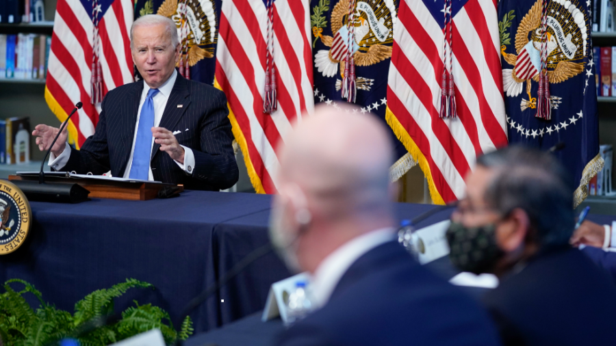 President Biden speaks during a meeting with business leaders about the holiday shopping season, in the library of the Eisenhower Executive Office Building