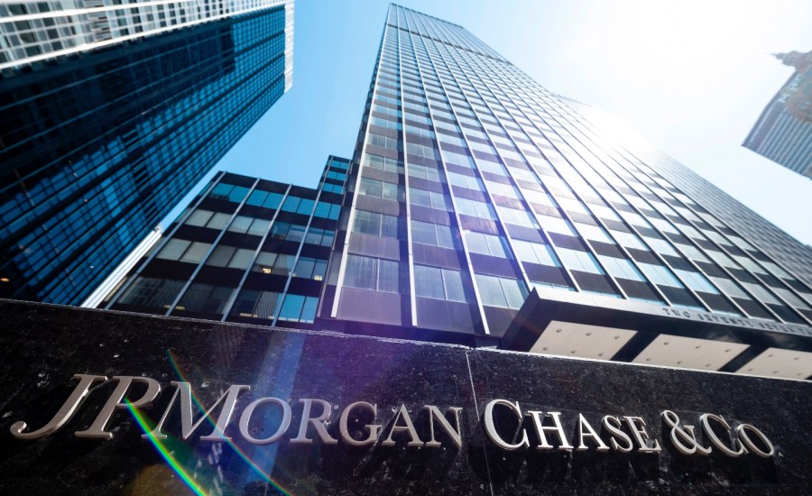 A sign with the name JP Morgan Chase and Co under the company's headquarter building