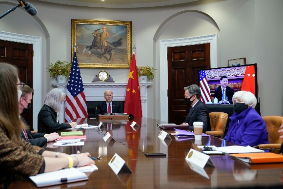 President Joe Biden meets virtually with Chinese President Xi Jinping from the Roosevelt Room of the White Hous