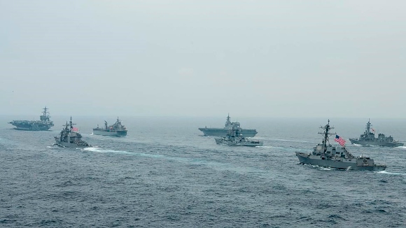 US Navy aircraft carrier USS Carl Vinson (CVN 70) and other US and Allies vessels transit the Bay of Bengal