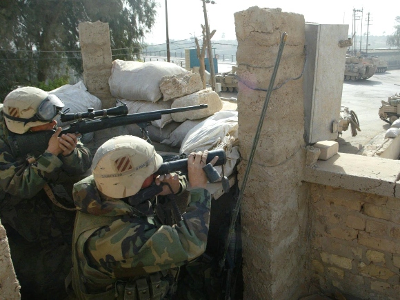 US Army sniper takes aim on targets, Al Hindiyah, Iraq