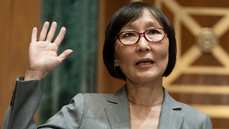 Saule Omarova is sworn in during a Senate hearing to examine her nomination to be the comptroller of the Currency