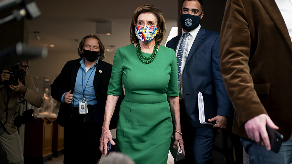 Speaker Nancy Pelosi (D-Calif.) arrives for a closed-door Democratic caucus meeting on Wednesday, November 3, 2021.