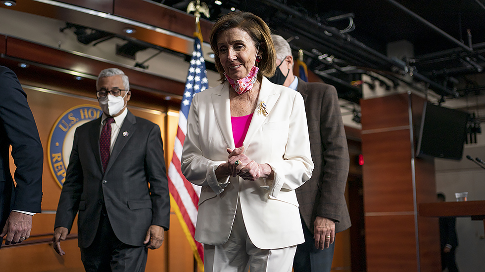 Speaker N Pelosi (D-Calif.) leaves a press conference on Friday, November 19, 2021 after the Build Back Act vote.