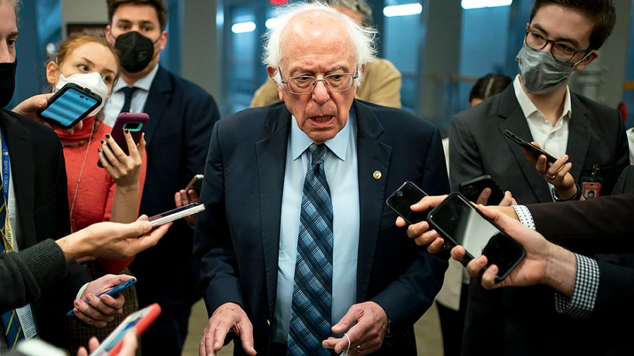 Sen. Bernie Sanders (I-Vt.) addresses reporters about Sen. Joe Manchin’s (D-W.Va.) recent positions as he arrives to the Capitol for votes regarding nominations on Tuesday, November 2, 2021.