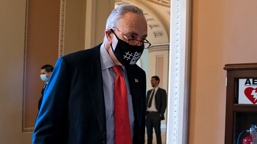 Majority Leader Charles Schumer (D-N.Y.) arrives for a Senate Democratic luncheon on Thursday, November 18, 2021 as the Senate discuss moving forward with debating the National Defense Authorization Act.