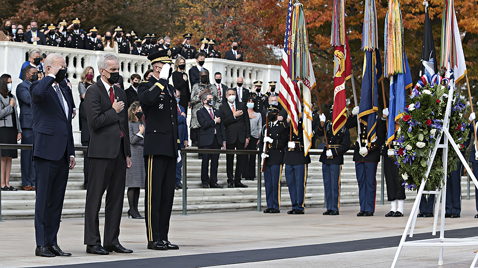 President Biden, Sec. of Veterans Affairs Denis McDonough and Major General Allan Pepin participate in a wreath-laying ceremony on the 100th anniversary of the Tomb of the Unknown Soldier at Arlington National Cemetery in Arlington, Va., on Veterans Day.