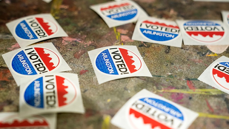 Stickers are seen at the Arlington Arts Center in Arlington, Va., on Tuesday, November 2, 2021. Virginia is voting for governor, state house and senate races.