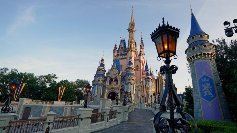 The newly painted Cinderella Castle at the Magic Kingdom at Walt Disney World is seen with the the crest to celebrate the 50th anniversary of the theme park