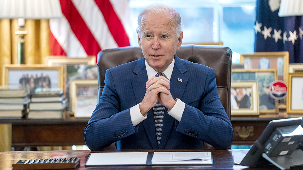 President Biden delivers remarks prior to signing an executive order on delivering the government services and experience the American people expect and deserve during a ceremony in the Oval Office on Dec. 13, 2021.