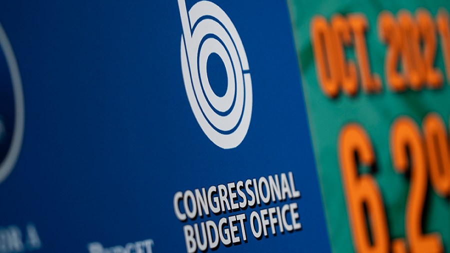 The Congressional Budget Office logo is seen during a press conference held by Sen. Lindsey Graham (R-S.C.) to discuss the Build Back Better Act on Friday, December 10, 2021.