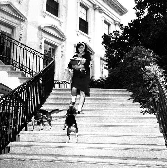 Luci, daughter of president and Mrs. Lyndon Johnson, stops on the White House steps