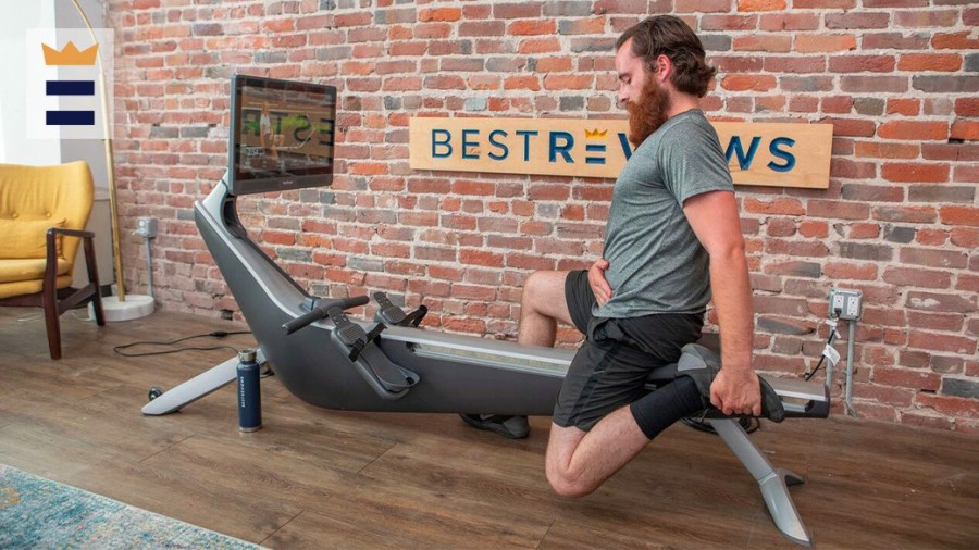 Man with a beard working out at home on fitness equipment