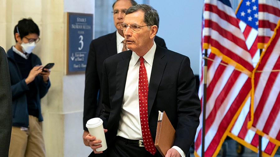 Sen. John Barrasso (R-Wyo.) arrives for the weekly Senate Republican policy luncheon on Tuesday, January 4, 2022.