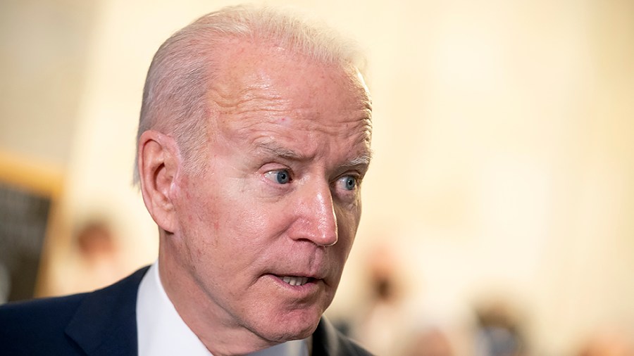 President Biden speaks to reporters after a Democratic caucus luncheon at the Senate Russell Office building to discuss voting rights and filibuster reform on Thursday, January 13, 2022.