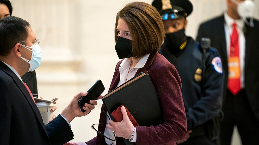 Sen. Catherine Cortez Masto (D-Nev.) speaks to a reporter as she arrives before President Biden arrives for a Democratic caucus luncheon at the Senate Russell Office building to discuss voting rights and filibuster reform on Thursday, January 13, 2022.