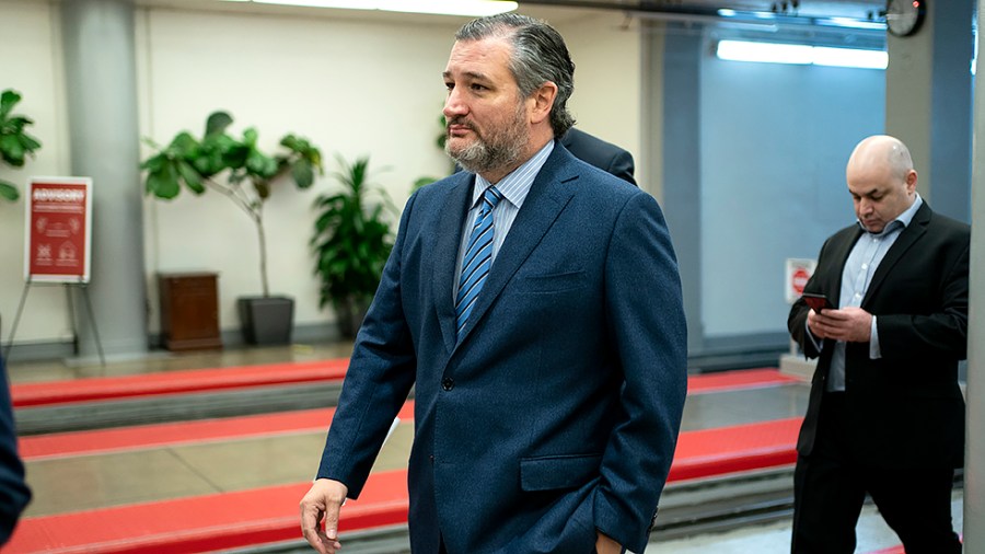 Sen. Ted Cruz (R-Texas) arrives to the Capitol for a cloture vote regarding a nomination on Wednesday, January 5, 2022.