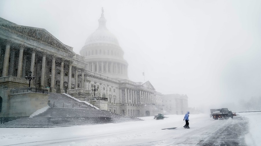 The U.S. Capitol is seen during a snow storm on Monday, January 3, 2022. The Washington, D.C., area is forecasted to receive five to six inches of snow before the afternoon.