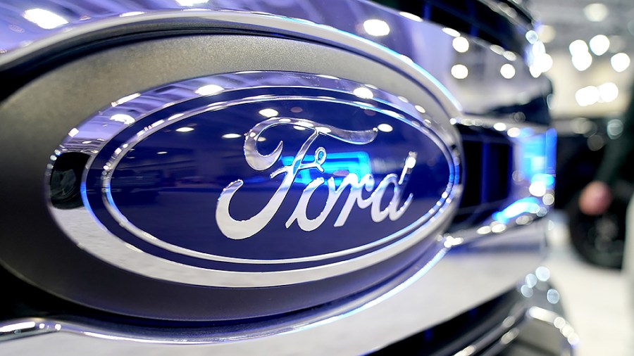 A Ford badge is seen on a pickup truck at the Washington, D.C., Auto Show at the Walter E. Washington Convention Center on Monday, January 24, 2022.