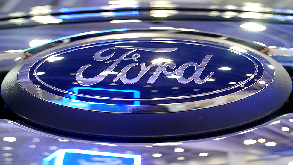A Ford badge is seen on a pickup truck at the Washington, D.C., Auto Show at the Walter E. Washington Convention Center on Monday, January 24, 2022.
