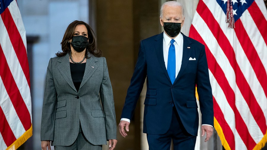 Vice President Kamala Harris and President Joe Biden arrive to give remarks in Statuary Hall of the U.S Capitol in Washington, D.C., on Thursday, January 6, 2022 to mark the year anniversary of the attack on the Capitol.