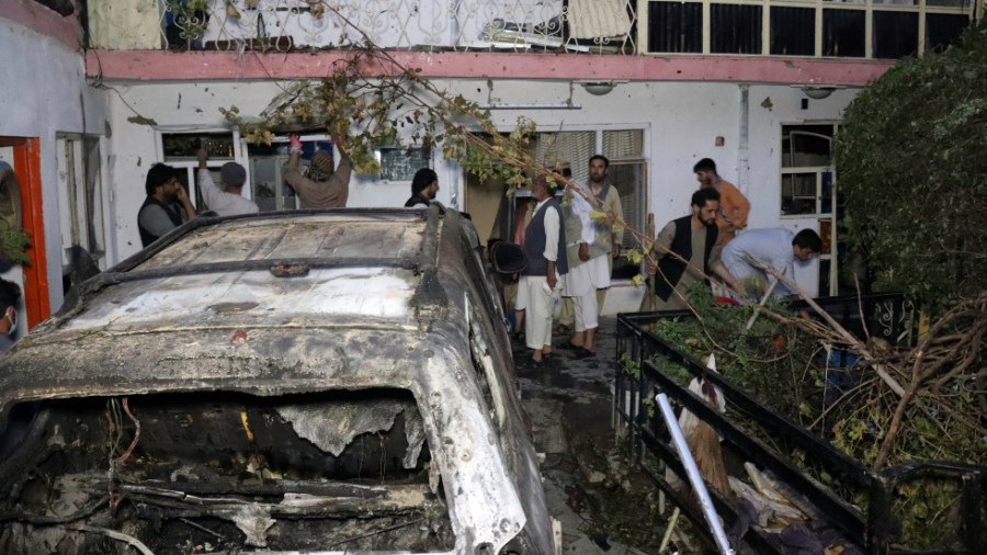 Afghans inspect damage of Ahmadi family house after the August U.S. drone strike in Kabul