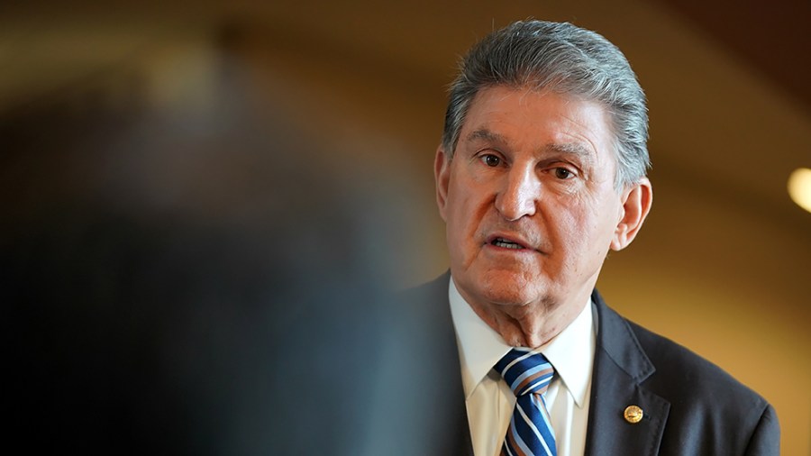 Sen. Joe Manchin (D-W.Va.) addresses reporters to discuss Covid-19 on Tuesday, January 4, 2022. He also took questions regarding Build Back Better and other legislative issues.